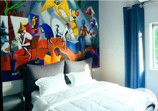  孟州对于酒店的墙体彩绘而言更注重哪些方面？